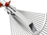 a large metal raket with a red handle on a white surface