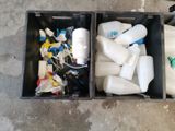 two plastic containers with different types of items in them