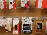many different items on the shelf in the store