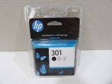 a close up of a package of ink cartridges on a white surface