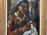 an oil painting of a woman holding a doll in her hands