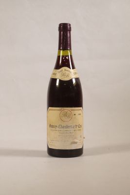 a bottle of wine that is sitting on a table