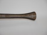 a close up of a baseball bat on a white surface