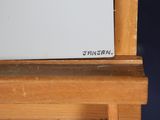 a close up of a microwave on a wooden table