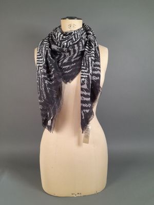 a black and white scarf on a mannequin mannequin mannequin mannequin mannequin mannequin mannequin mannequin mann