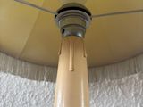 a lamp that is on a table in a room