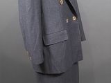 an image of a woman ' s suit and skirt on a mannequin