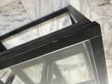 a picture of a glass door with a black frame