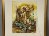une image représentant un tableau d'un homme sur une croix, dans un cadre doré