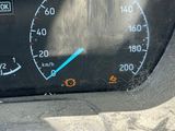 a close up of a car dashboard with a speedometer
