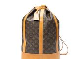 Sac à dos Louis Vuitton en toile Monogram et cuir