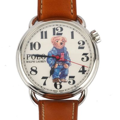 a watch with a teddy bear on the face of it