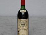 a bottle of wine that is sitting on a table