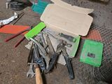 many tools that are sitting on the floor next to each other