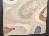 a picture of a painting on the wall of a room