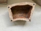 a small piece of wood that is sitting on the floor