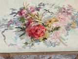 une peinture représentant un bouquet de fleurs sur une toile