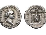 a silver coin with an image of a man on it
