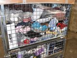 a metal cart with many items in it in a warehouse
