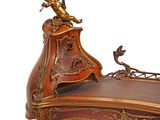 a wooden table with a clock on top of it
