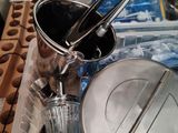 many pots and pans that are on a tray