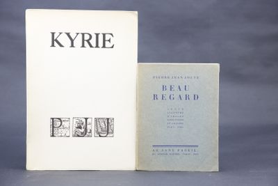 two books sitting on top of a table next to each other