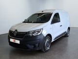 La camionnette blanche est garée dans une grande pièce