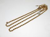 a gold plated necklace with a chain and a clasp