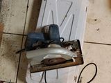 a box with a stapler and a stapler on the floor