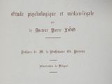 an old book with a black and white title on it