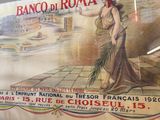 a poster of a woman in a long dress on a wall