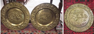 two pictures of a pair of brass plates on a red carpet