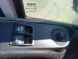 a close up of a car ' s interior with the controls on