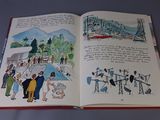 an open book with a picture of people on it