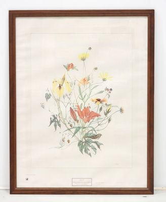 une photo d'un tableau représentant un bouquet de fleurs accroché au mur