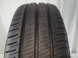 a close up of a tire on a white surface