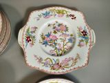 many plates that are sitting on a table