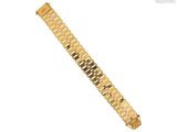 un gros plan d'un bracelet de montre en or sur fond blanc