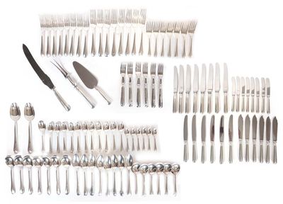 a lot of silverware on a white table