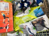 a shopping cart filled with assorted items in a store