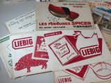 many different types of advertising papers on a table