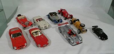 a lot of toy cars that are on a table
