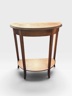 a small wooden table with a shelf on top of it