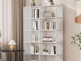 an image of a living room with a white bookcase