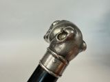 a close up of a metal object on a stick