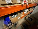 many boxes of assorted items on the shelves