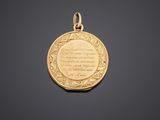 a gold locke with a poem written on it