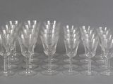 a lot of empty wine glasses sitting on a table