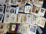 a lot of old postcards on the table
