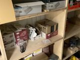 a shelf with many different types of electronics on it